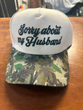 Sorry 'bout my husband- hat