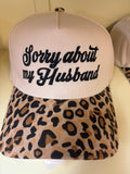 Sorry 'bout my husband- hat